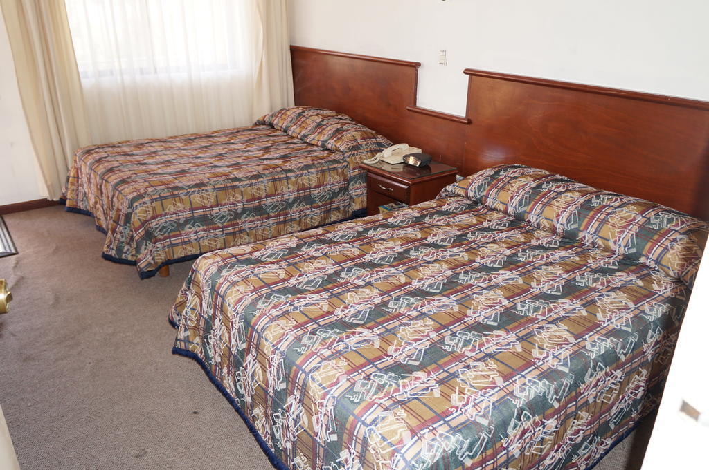 Maria Luisa Inn & Suites Juarez  Стая снимка