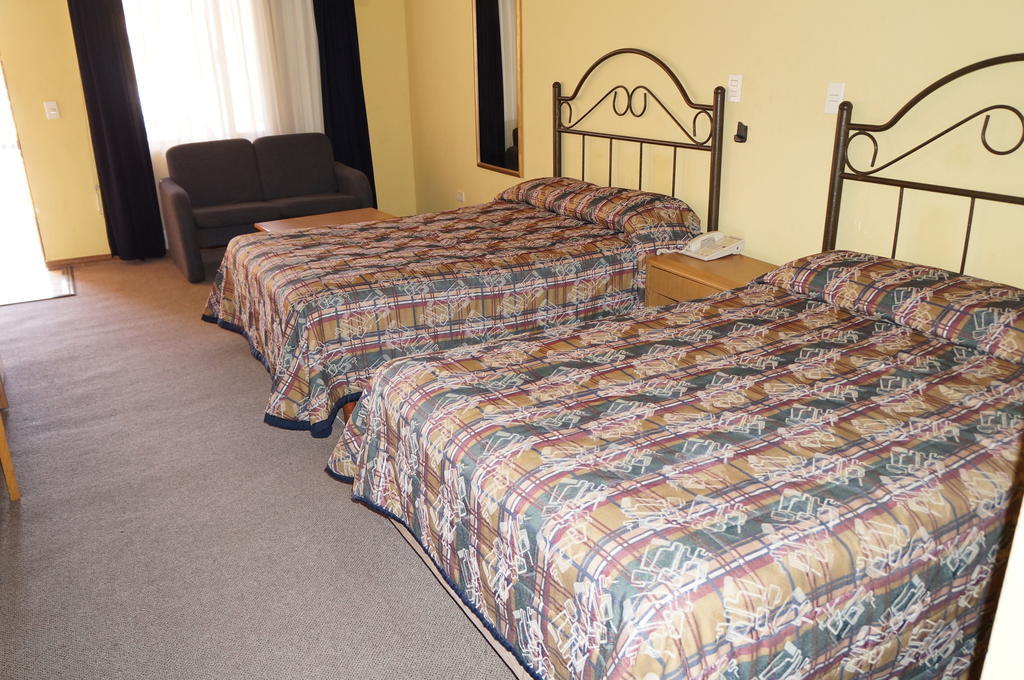 Maria Luisa Inn & Suites Juarez  Стая снимка